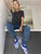 Woman wearing NASA space-themed astronaut slippers