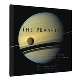 A book of cool photos of space from NASA featuring the planets.