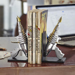 Retro space age bookends that look like Flash Gordon ray guns! From Pendulux.