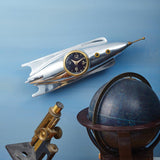 Rocket clock for your wall, by Pendulux. Silver color, large and impressive space gift shaped like a rocket ship!
