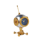 A cute space astronaut clock for your desk or table, by Pendulux with an aluminum and brass body, and a blue face, with an antenna on top to look like an astronaut helmet!