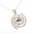 Spiral galaxy necklace with a genuine Campo del Celio meteorite in the center! A solid sterling silver spiral galaxy necklace is the perfect space gift. Shown on white background.