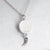 back of swaying crescent moon meteorite necklace in sterling silver