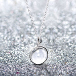 Lunar full moon dust meteorite necklace in sterling silver and glass