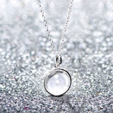 Lunar full moon dust meteorite necklace in sterling silver and glass