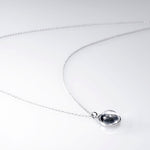 Lunar full moon dust meteorite necklace in sterling silver and glass