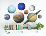The Planets Puzzle - all 8 space puzzles completed and hung on wall
