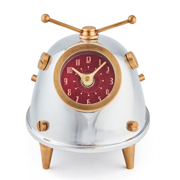 A cute space alien clock for your desk or table, by Pendulux with an aluminum and brass body, and a red face, with antennae on top to look like a bug!