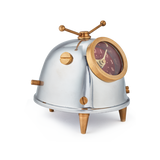 A cute space alien clock for your desk or table, by Pendulux with an aluminum and brass body, and a red face, with antennae on top to look like a bug!