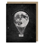Space themed congratulations card with  full moon in space as a hot air balloon! Vintage style.