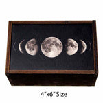 Medium sized wooden trinket box with moon phases on sliding lid.