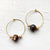 A unique pair of space earrings depicting planet Mars with it's two moons! Large brass space/planet themed hoop earrings. A fun space jewelry gift!